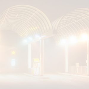 gas station at night with a white fade overlay